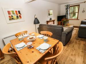 Posezení v ubytování Gardener's Cottage + 12 fotografií