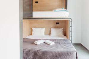 Posteľ alebo postele v izbe v ubytovaní Athens Backpackers