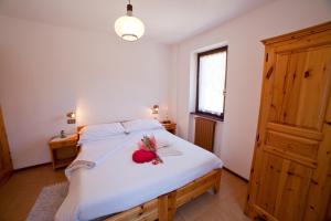 Postel nebo postele na pokoji v ubytování Chalet Bucaneve