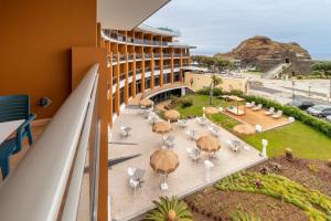 an overhead view of a building with tables and chairs at Aqua Natura Bay in Porto Moniz