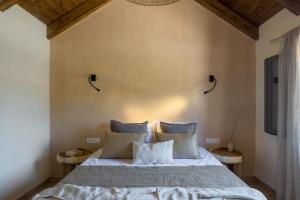 A bed or beds in a room at La Baracca Még 37 kép