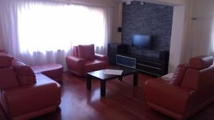 Un televizor și/sau centru de divertisment la Apartments Hana
