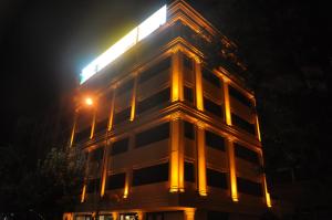 a building with a light on top of it at night at GOLAZ SUİT OTEL in Ankara