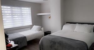 Krevet ili kreveti u jedinici u okviru objekta Modern Home Carndonagh