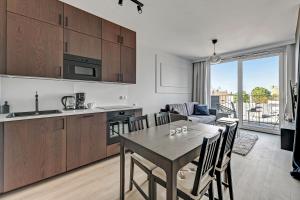 Kuchyňa alebo kuchynka v ubytovaní Grand Apartments Chlebova