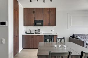 Kuchyňa alebo kuchynka v ubytovaní Grand Apartments Chlebova