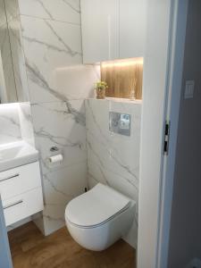 Kúpeľňa v ubytovaní Apartament PERŁA POŁUDNIA