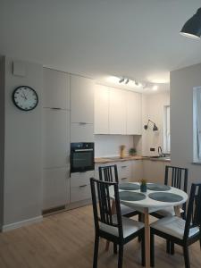 Kuchyňa alebo kuchynka v ubytovaní Apartament PERŁA POŁUDNIA