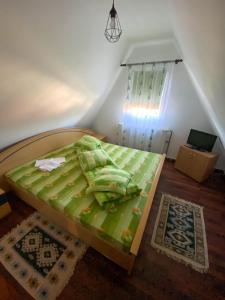 Tempat tidur dalam kamar di Casa Daria Ranca