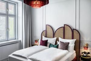 Hotel Josefine 객실 침대