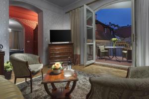 TV o dispositivi per l'intrattenimento presso Boutique Hotel Constans