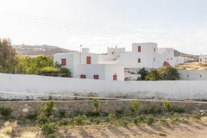 a group of white buildings in the distance at Marathi Mykonos in Klouvas
