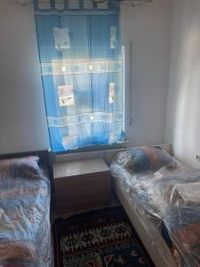 Postel nebo postele na pokoji v ubytování Haus Zauberwald