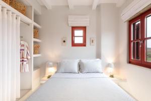 Postel nebo postele na pokoji v ubytování Marathi Mykonos