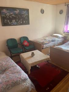 Postel nebo postele na pokoji v ubytování Haus Zauberwald