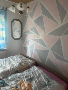 Postel nebo postele na pokoji v ubytování Haus Zauberwald