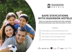 a poster of a family with a soccer ball at Radisson Blu Atria Bengaluru in Bangalore