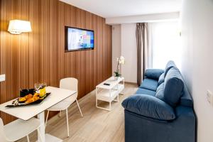 TV a/nebo společenská místnost v ubytování Hotel Rosamar