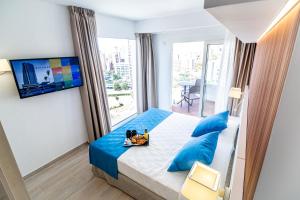 TV a/nebo společenská místnost v ubytování Hotel Rosamar