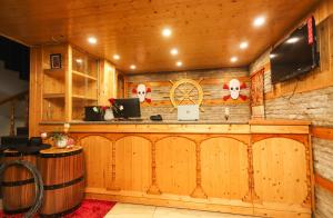 A kitchen or kitchenette at Hotel Smugglers Mountain View - central heated & air Cooled #Free Pick from Volvo Bus Stand