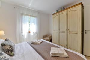 Posteľ alebo postele v izbe v ubytovaní Villa Luciana Spa House, Buje