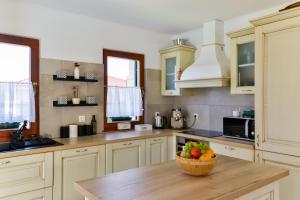 Kuchyňa alebo kuchynka v ubytovaní Villa Luciana Spa House, Buje