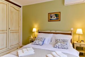Posteľ alebo postele v izbe v ubytovaní Villa Luciana Spa House, Buje