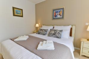 Posteľ alebo postele v izbe v ubytovaní Villa Luciana Spa House, Buje
