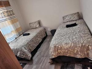 Vuode tai vuoteita majoituspaikassa Nandi Gosa Apartments