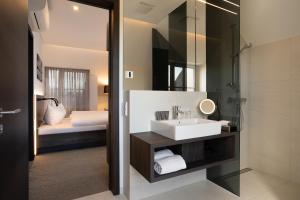 Postel nebo postele na pokoji v ubytování Hotel Spitzerberg by b-smart