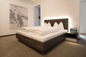 Postel nebo postele na pokoji v ubytování Hotel Spitzerberg by b-smart