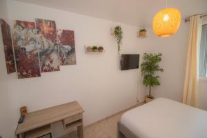 Postel nebo postele na pokoji v ubytování La Hearty Room Logement en Colocation