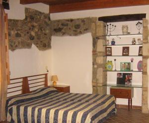 Postel nebo postele na pokoji v ubytování Borgo Medievale Squillace