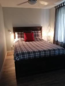 Postel nebo postele na pokoji v ubytování Gîte Shoreline de la terre à la mer