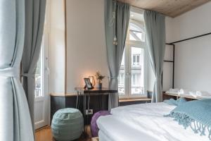 Voodi või voodid majutusasutuse GRAND your home with common kitchens with self check-in toas
