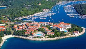 an aerial view of a resort and a harbor at Antique center Pula in Pula