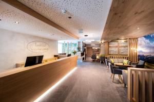 Telewizja i/lub zestaw kina domowego w obiekcie Landhotel Kirchenwirt
