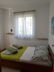 Postel nebo postele na pokoji v ubytování Villa Triton