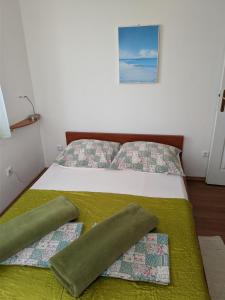 Postel nebo postele na pokoji v ubytování Villa Triton