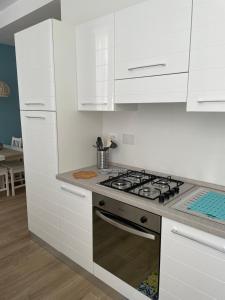 Η κουζίνα ή μικρή κουζίνα στο Casa Aiga Marina +21 φωτογραφίες