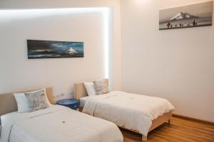 Postel nebo postele na pokoji v ubytování Adamas House Hotel Boutique