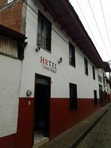 a building with a hotel sign on the side of it at San Pablo in Pátzcuaro