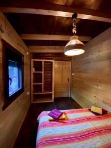 A bed or beds in a room at Sojenica Pustolov - Ada Bojana