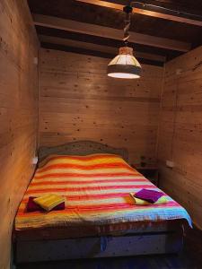 A bed or beds in a room at Sojenica Pustolov - Ada Bojana