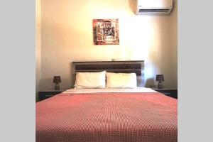 A bed or beds in a room at Family room Rhodes Greece