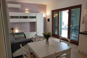 Posedenie v ubytovaní Poggio ai Grilli Apartment