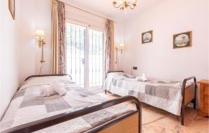Posteľ alebo postele v izbe v ubytovaní Lovely Home In Benalmádena