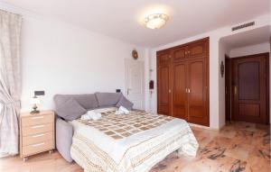 Posteľ alebo postele v izbe v ubytovaní Lovely Home In Benalmádena