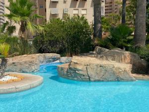 Bazén v ubytovaní Alicante Apartamento en la Playa Muchavista-San Juan - Marluma frente al Mar alebo v jeho blízkosti