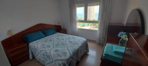 Posteľ alebo postele v izbe v ubytovaní Alicante Apartamento en la Playa Muchavista-San Juan - Marluma frente al Mar